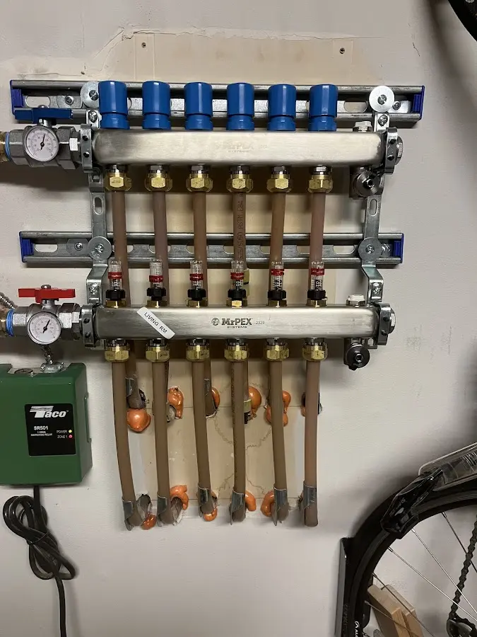 Plumber performing Water Heater Repair at a residential property in Old Forge